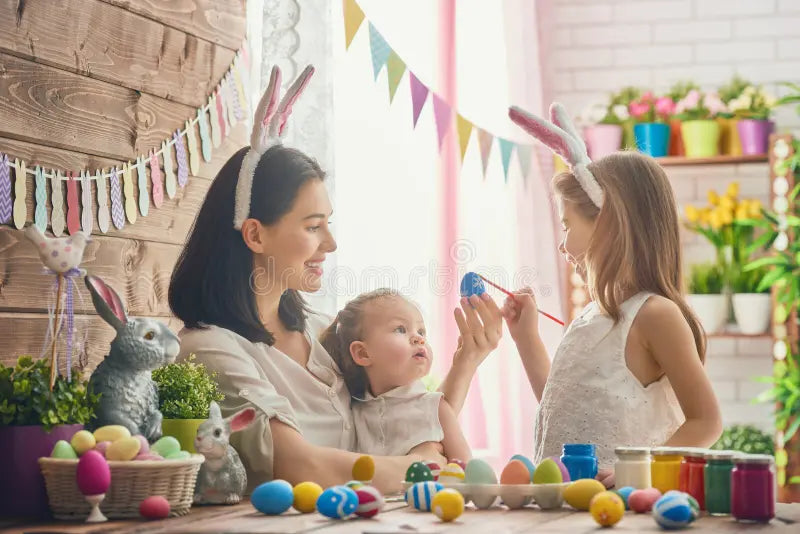 files/family-preparing-easter-mother-her-daughter-painting-eggs-happy-cute-little-child-girl-wearing-bunny-ears-86566495.webp